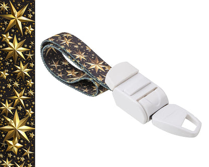 MEDICININIS TURNIKETAS su auksinių žvaigždžių raštų dirželiu ir balta sagtele. Pateikiamas turniketo juostelės rašto paveikslėlis