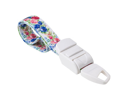MEDICININIS TURNIKETAS su baltu spalvotų gėlių raštų dirželiu ir balta sagtele