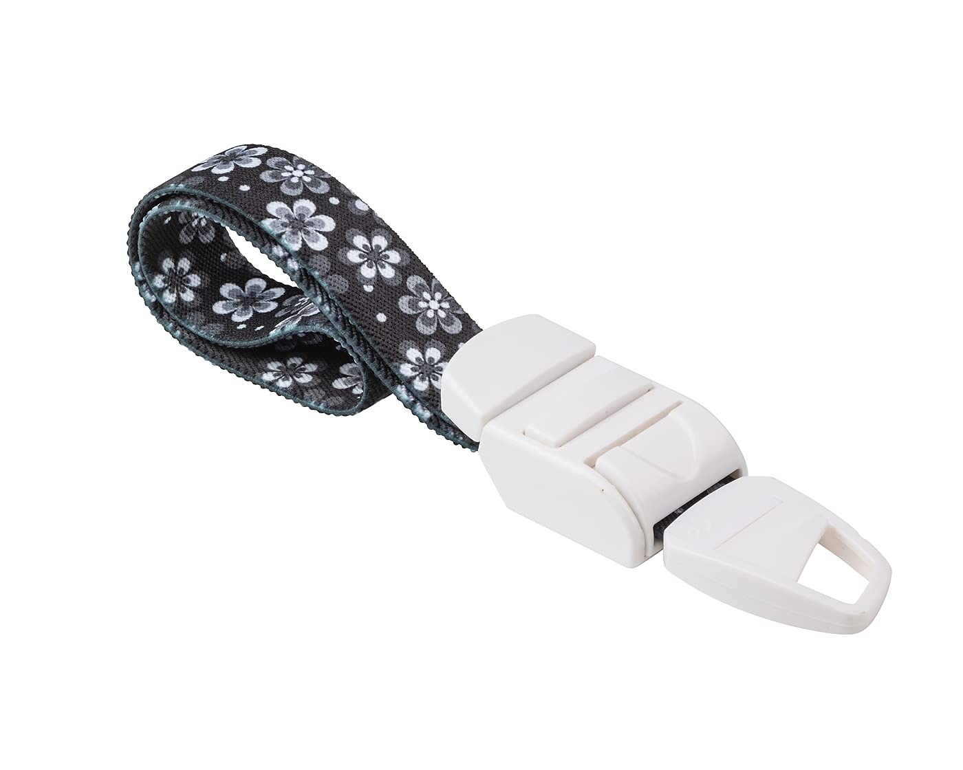 MEDICININIS TURNIKETAS su juodu gėlių raštų dirželiu ir balta sagtele.