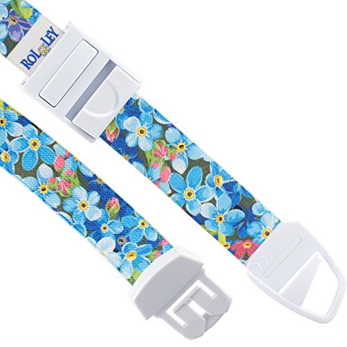 MEDICININIS TURNIKETAS su mėlynu gėlių raštų dirželiu ir balta sagtele.